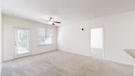 Located at 4229 Stonecrest Dr in Burlington, NC, this single-floor, 2-bedroom, 3-bathroom home offers a well-organized and functional layout. The combined kitchen and living area serves as the heart of the home, featuring a peninsula with granite-look countertops, warm honey-toned cabinetry, black appliances including a range and built-in microwave, and hard-surface flooring. The living area flows naturally from the kitchen and is brightened by natural light and a ceiling fan overhead, with plush neutral carpeting underfoot.

Both bedrooms are carpeted and equipped with ceiling fans, offering a comfortable, quiet atmosphere. The spacious primary bedroom provides ample room, while each bedroom benefits from natural light through slatted blinds. Two well-sized closets with wire shelving systems provide practical storage solutions throughout.

The three bathrooms are clean and functional, with at least one featuring a full soaking tub with a tiled surround and brushed nickel fixtures. A dedicated laundry room with washer/dryer hookups and additional shelving adds everyday convenience. The neutral color palette and consistent finishes throughout create a cohesive, move-in-ready living environment.