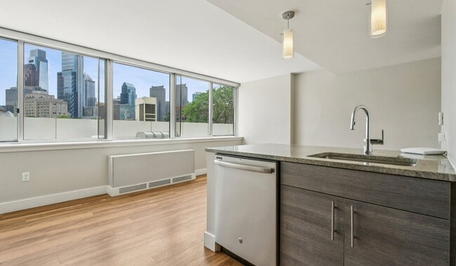 Studio floor plan features an open concept layout with a spacious living area - Park Towne Place