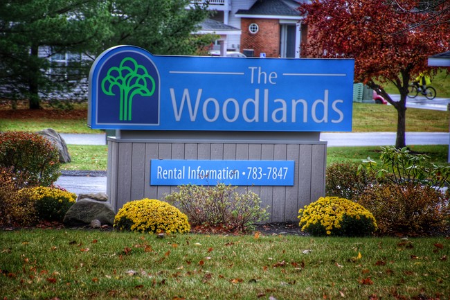 Welcome Sign - The Woodlands Apartments