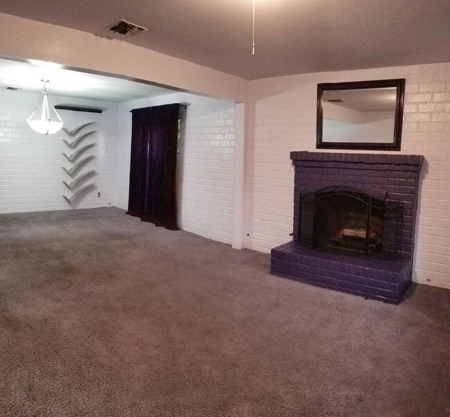 Lg living/dining room w/gas or wood fireplace - 13300 Herron St
