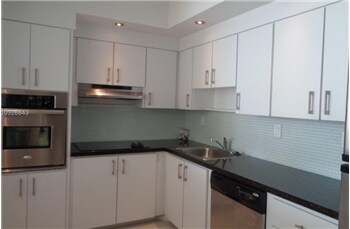 Building Photo - 19380 Collins Ave