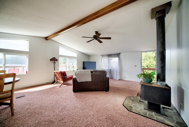 Spacious living room with 60 inch tv, basic cable WIFI. - 5170 W Shore Rd