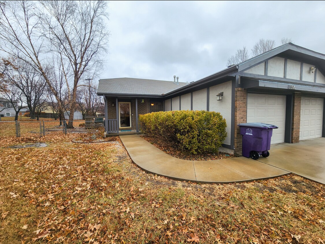 Primary Photo - West Side + Fenced-in Yard + Attached 1-Ca...