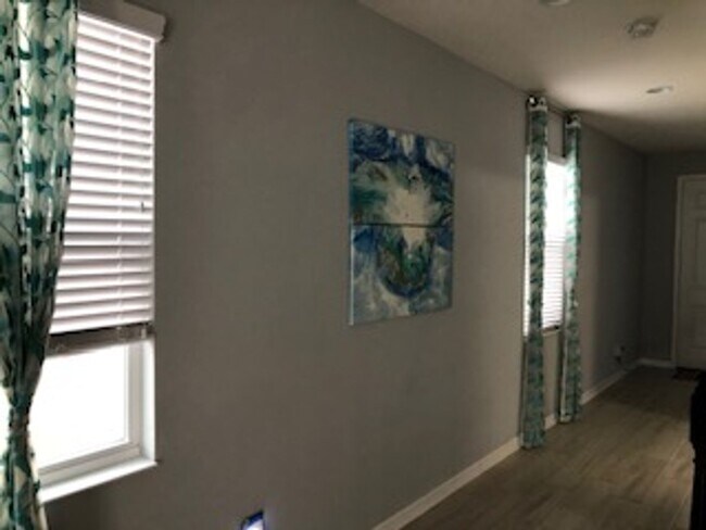 Foto del edificio - PRATICALLY BRAND NEW HOME IN GATED COMMUNITY!