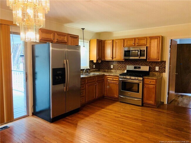 Foto del edificio - 5701 Homestead Ct