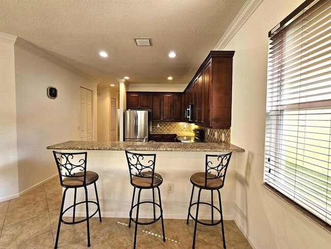 Building Photo - 7533 Topiary Ave