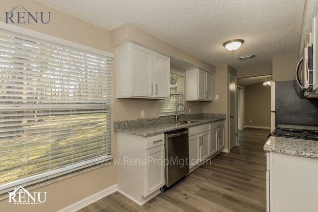 Building Photo - This Summer Special is Heating Up!: 50% of...