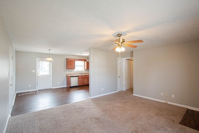 Building Photo - Pet Friendly with Fenced Yard!