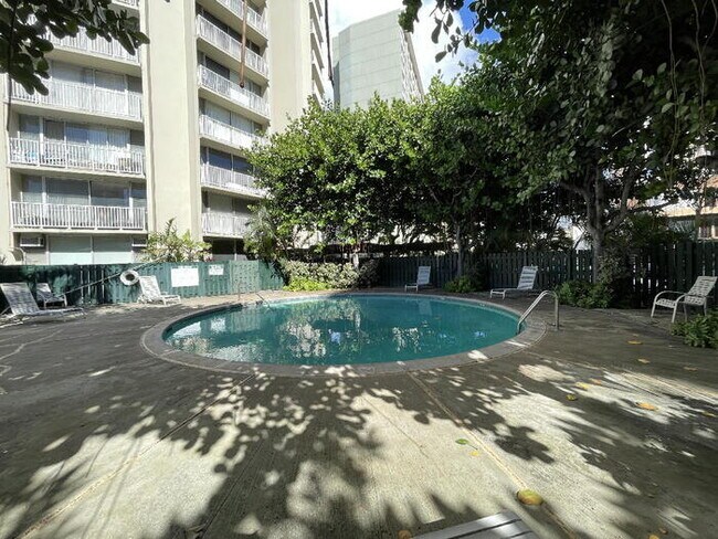 Building Photo - HOLIDAY VILLAGE studio, sec, A/C, lanai, pool