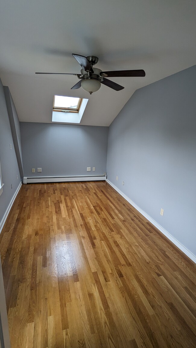 bedroom with walk in closet - 1 West St