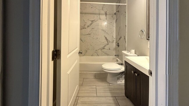 Photo - Modern 3-Bed, 1.5-Bath Rental with Updated Finishes House