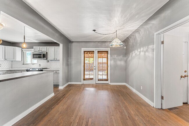 Building Photo - Charming Home with Open Floor Plan, wood f...