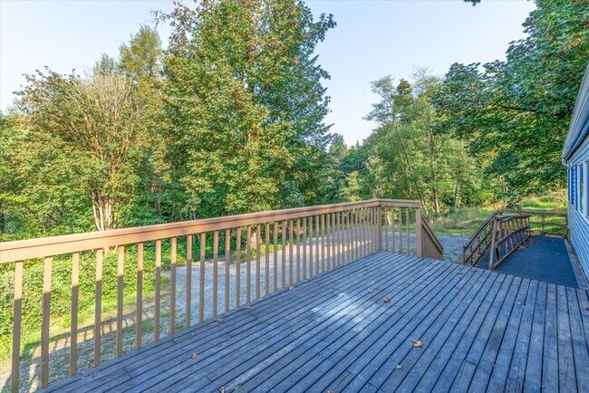 Building Photo - UPDATED THREE BEDROOOM TWO BATH