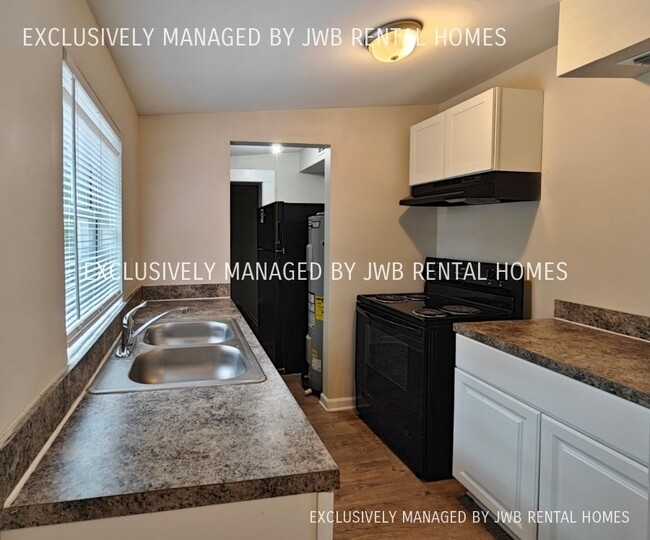 Building Photo - 9721 Aberdare Ave W