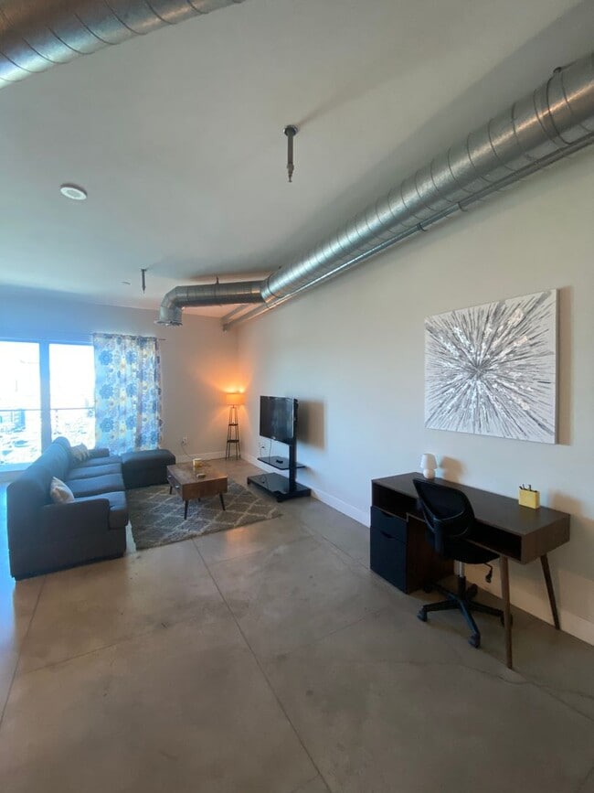 Building Photo - Stunning Fully Furnished Loft with Breatht...