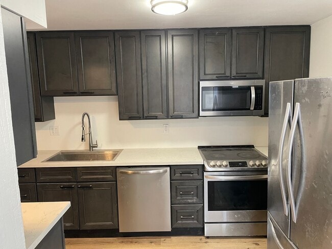 Building Photo - Newly Renovated 4-Bedroom Ranch with Basem...