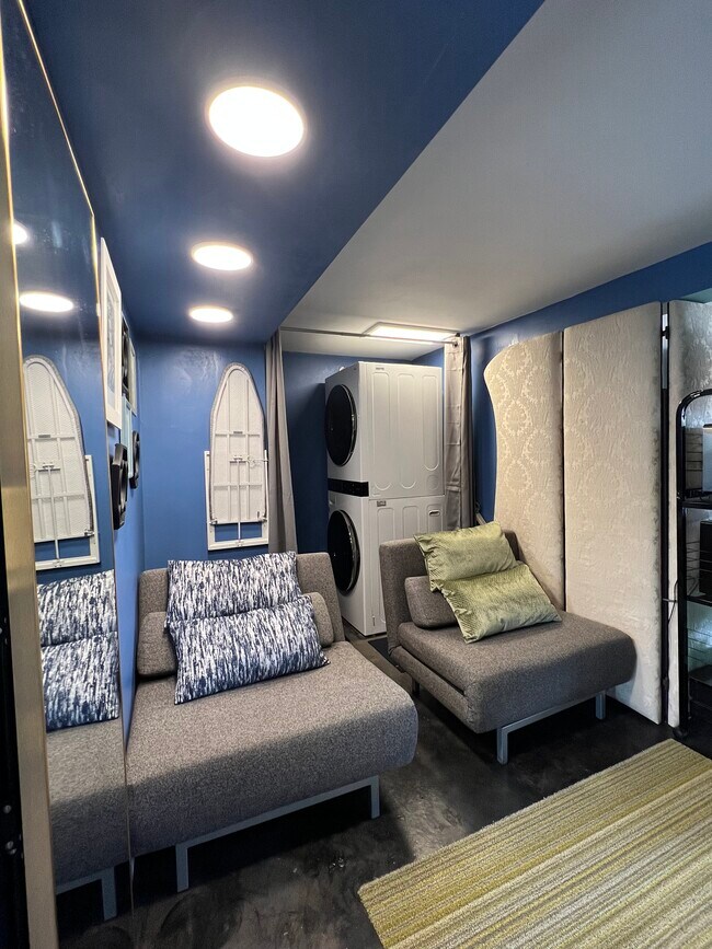 Stackable laundry with 2 fold out twin seats - 3003 Prospect Ave