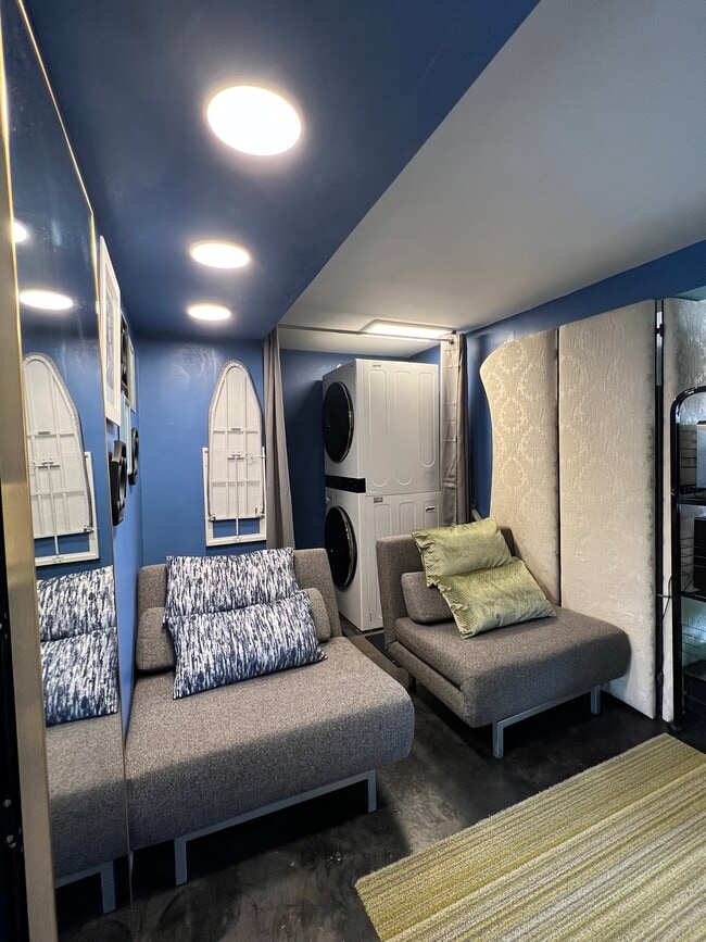 Stackable laundry with 2 fold out twin seats - 3003 Prospect Ave