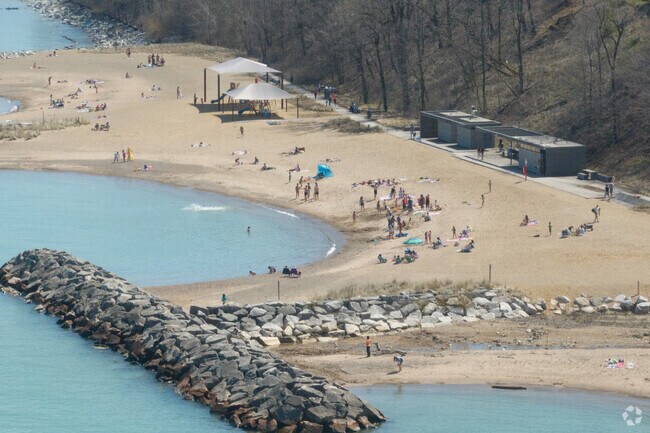 Rosewood Beach is a popular spot in Highland Park on a hot day.