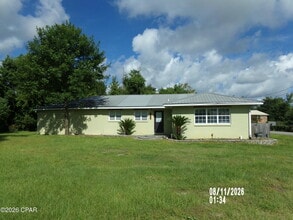 Building Photo - 6530 Dahlia Dr