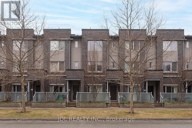 Building Photo - 315-315 Village Green Square