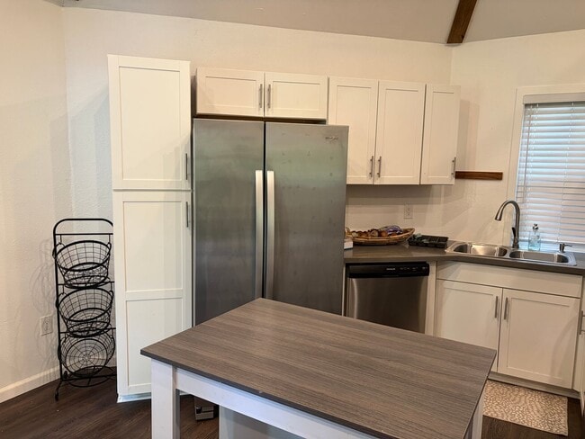 Building Photo - Charming "Tiny Home" Living – 1BR + Loft Carriage House
