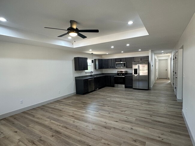 Building Photo - NEW CONSTRUCTION 5 Bed 3 Bath w/ Walk Out ...