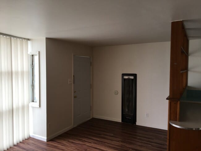 gas wall furnace in living room - 4 62nd Pl