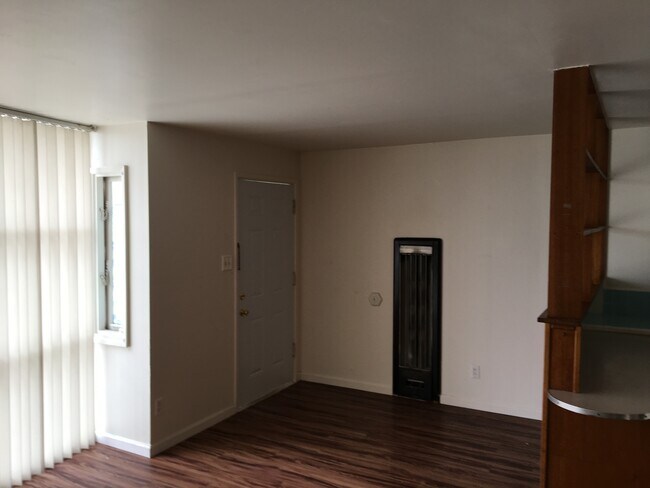 gas wall furnace in living room - 4 62nd Pl