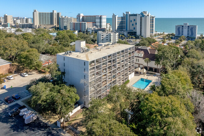 Rear with pool. - The Cane Patch Condominiums