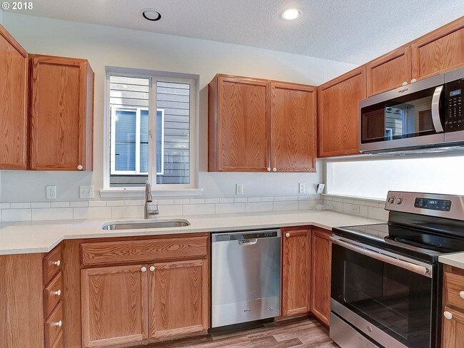 Building Photo - 3 br, 2.5 bath House - 1150 SE Bacarra Street