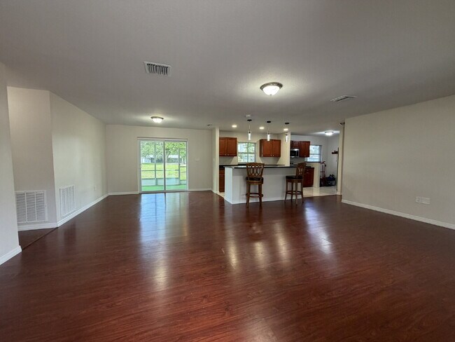 Building Photo - "Charming 3-Bedroom Home with Gleaming Hardwood Floors!"