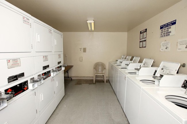 Laundry Room - Burnett Park Apartment Homes