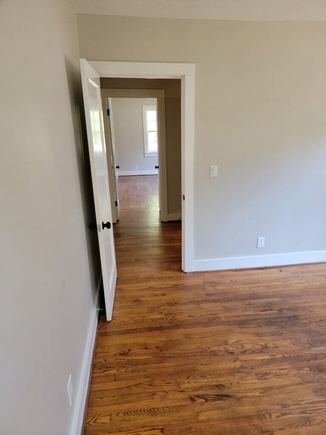 Building Photo - "Charming 3-Bed Retreat with Gleaming Hard...