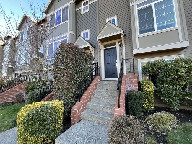 Building Photo - Bright 3-Level Townhome with Open-Concept Living, Built-In Fireplace & Modern Kitchen
