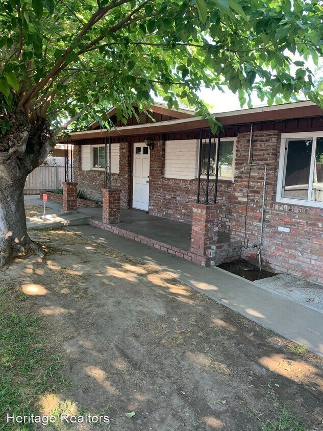 Foto principal - 3 br, 2 bath House - 9726 Garden Dr