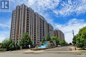 Building Photo - 18-PH18 Mondeo Dr
