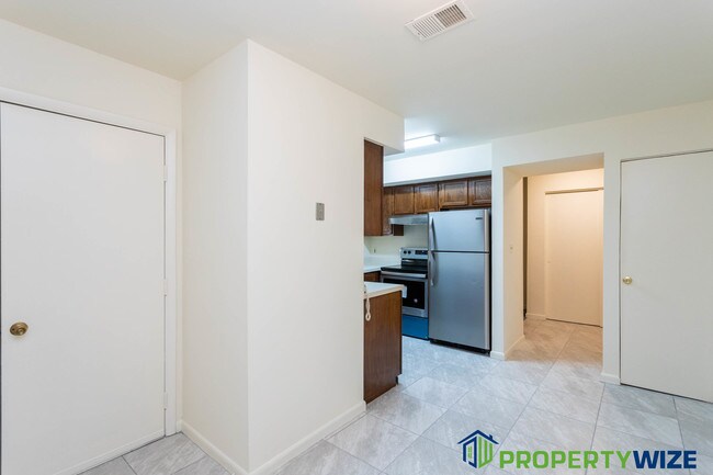 Building Photo - 8007 Greenspring Way