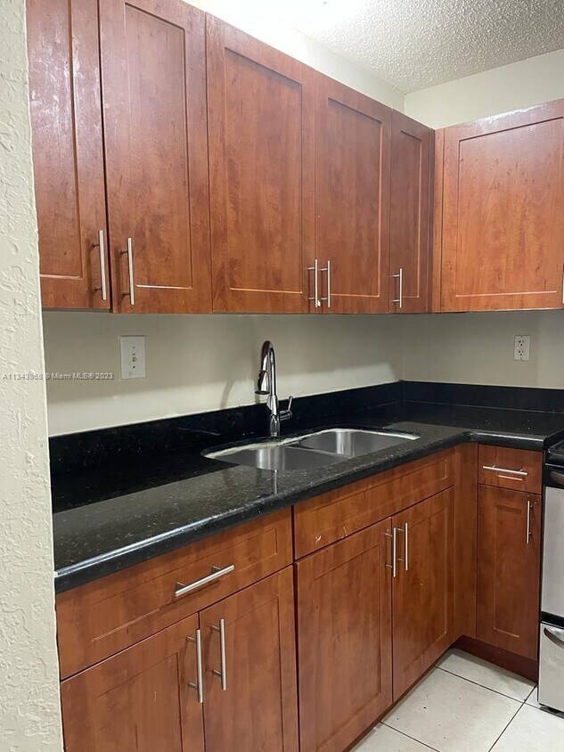 482 NW 165th St Unit A102, Miami, FL 33169 Condo for Rent in Miami