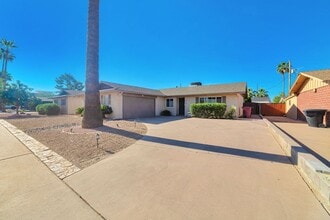 Building Photo - 8737 E Plaza Ave