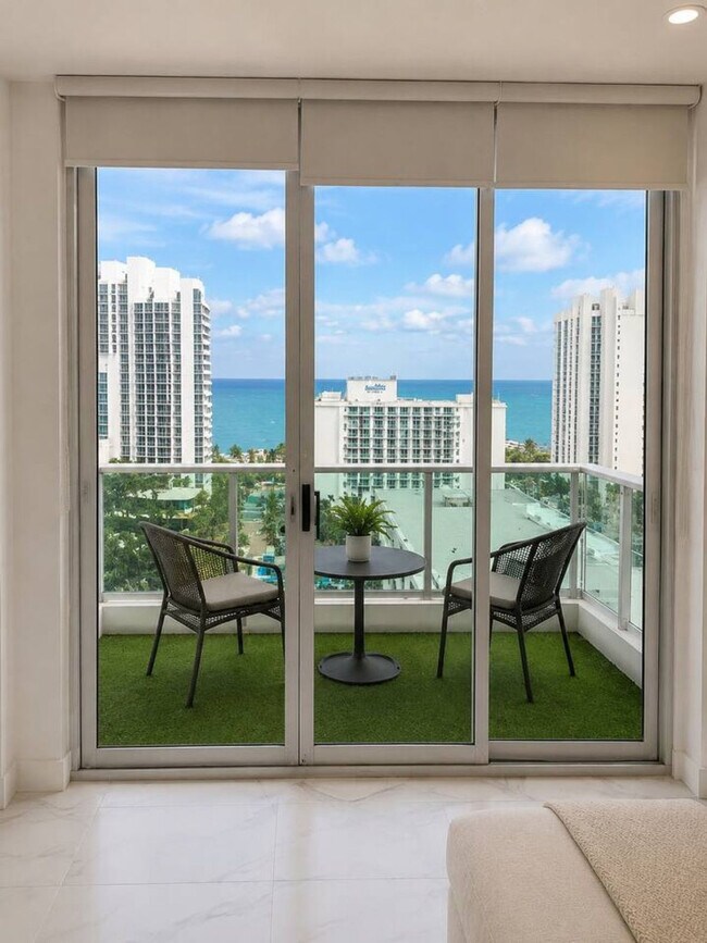 Building Photo - 19370 Collins Ave