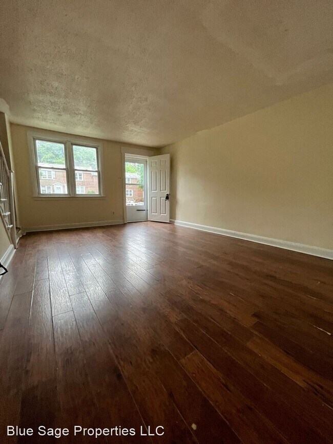 Building Photo - 3 br, 1.5 bath House - 239 W 22nd St