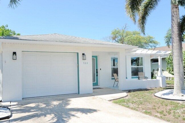 Building Photo - ANNUAL RENTAL Naples Park 3 Bedroom // 2 Bathroom Single Family Home