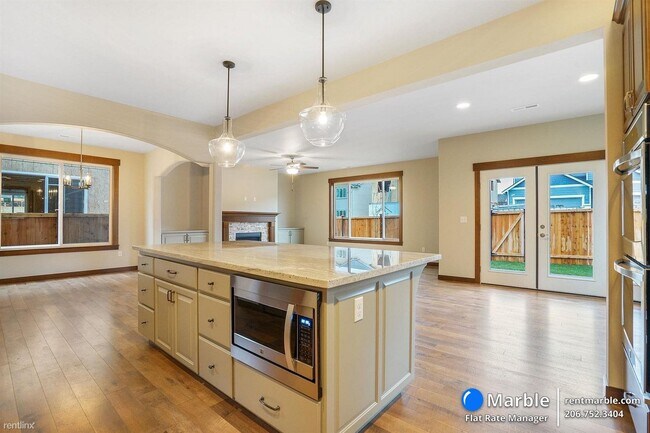Building Photo - 5 br, 3 bath House - 13128 123rd Avenue Ct E