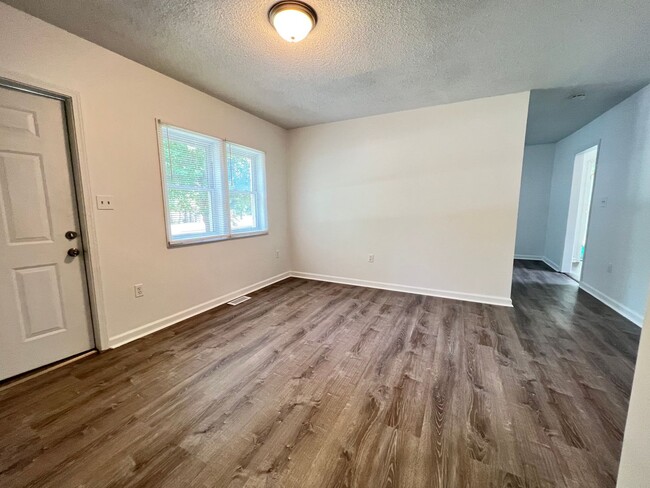 Building Photo - Sit Back, Relax. Your New View Awaits.
