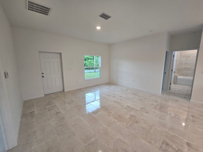 Foto del edificio - BRAND NEW 3/2/1 -SW LEHIGH ACRES FL