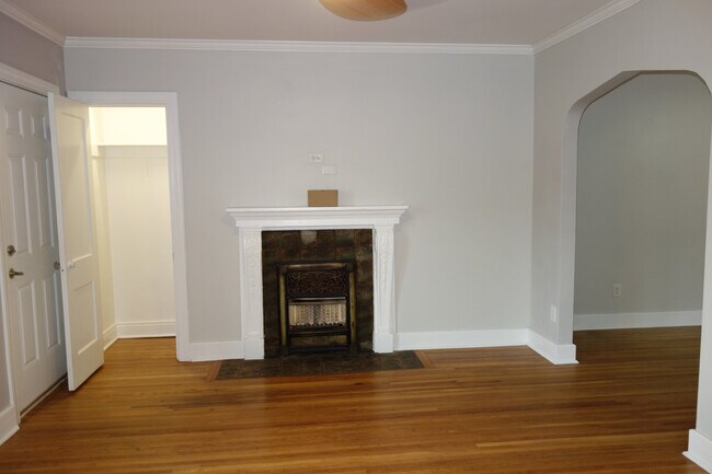 Living room view of fireplace and closet - 2239 E 18th St