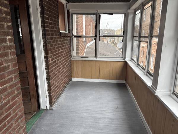 Enclosed front porch - 505 1/2 Jackson Ave