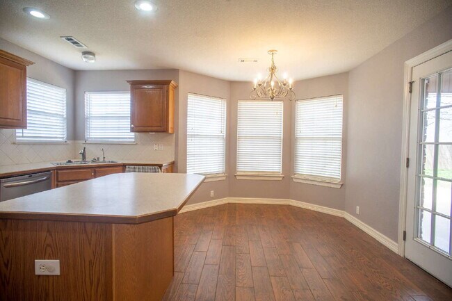 Building Photo - "Spacious 4-Bed Home with Granite Touch & Cozy Fireplace in Springdale!"