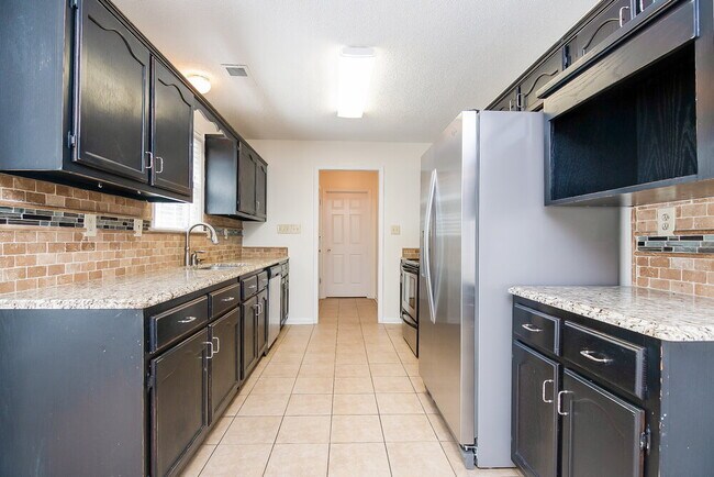 Building Photo - 1400 Milestone Dr